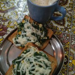 A picture of Spinach corn toast.