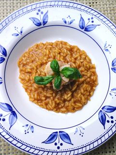 Foto di Risotto con bisque e tartare di gamberi