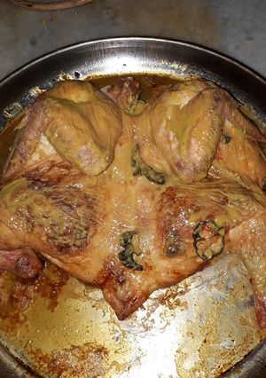 Una foto de Pollo al horno semi relleno