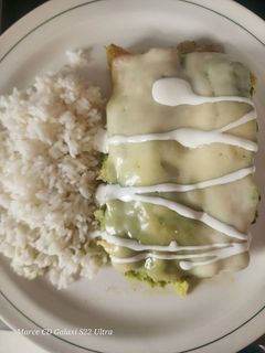 Una foto de Enchiladas en salsa de chile poblano