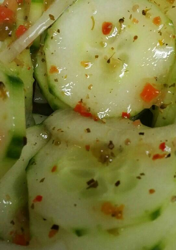 A picture of Cucumber and onion salad.