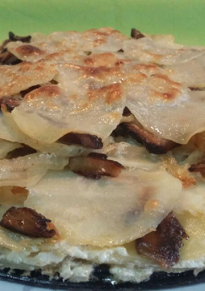Una foto de Pastel de patatas y setas