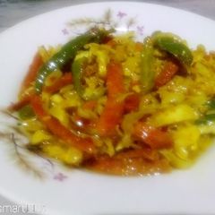 A picture of Cabbage carrot green chilli or garlic ka Achar.