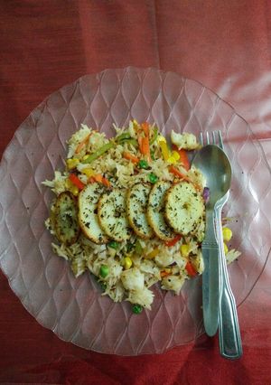 A picture of Veg fried rice with grilled potato.