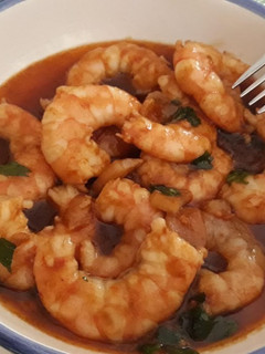 Una foto de Langostinos en salsa de ostras