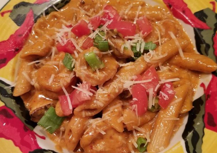 Steps to Prepare Speedy Penne with Cajun Hot Links and Chipotle Shrimp