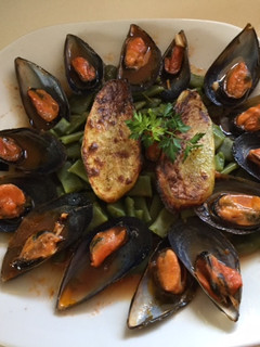 Una foto de Judías verdes con mejillones en salsa
