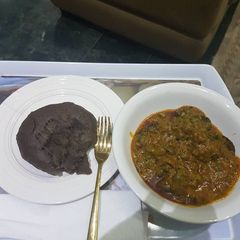 A picture of Banga soup and amala.