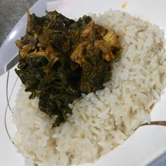 A picture of Vegetable sauce and rice.