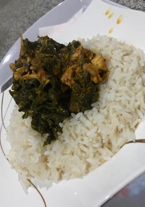 A picture of Vegetable sauce and rice.