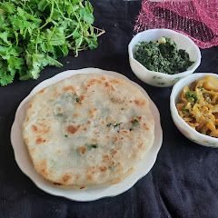 A picture of Paneer stuffed rice flour paratha.