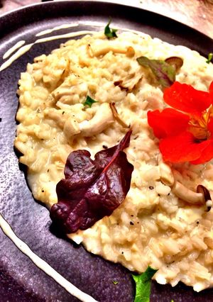 Foto di Risotto con stracchino e misto funghì con coulis di parmigiano