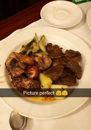 A picture of Potatoes steak and my honey grilled chicken.