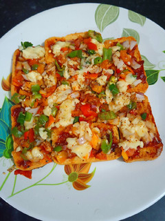 रस्क पिज़्ज़ा (Rask pizza) रेसिपी मुख्य फोटो