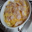 Patatas fritas con queso y pavo al horno