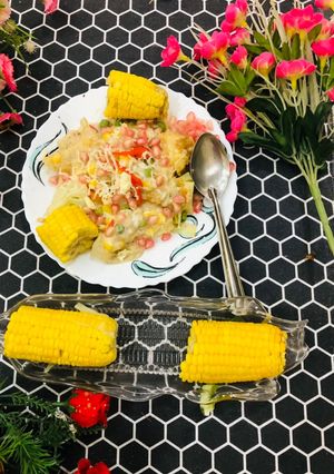 A picture of Vegetable Corn cheese in white sauce.
