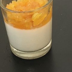 Coconut panna cotta with pineapple glaze A picture of Coconut panna cotta with pineapple glaze.