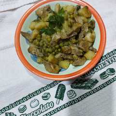 Foto di Carciofi con piselli e patate