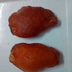 A picture of Baiguni(brinjal fritters).