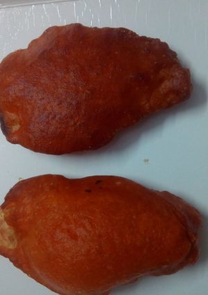 A picture of Baiguni(brinjal fritters).