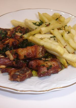 Foto principal de Costillas de cordero con patatas fritas