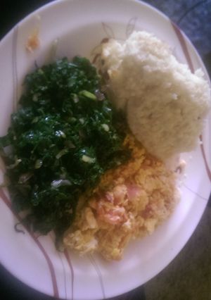 A picture of Mayai sukuma served with ugali.