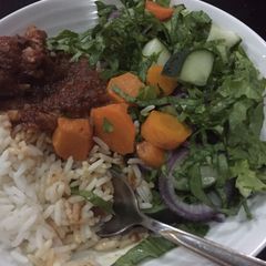 A picture of White rice and salad.