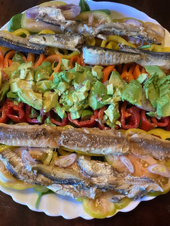 A picture of California Farm Spinach Sardine Salad.