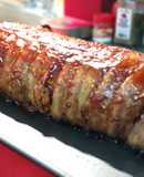 Rollo de carne envuelto con tocino