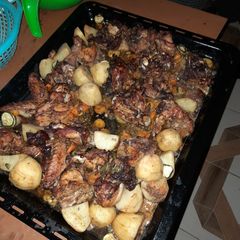 A picture of Oven Baked Chicken with Potatoes.