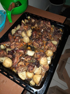 A picture of Oven Baked Chicken with Potatoes.
