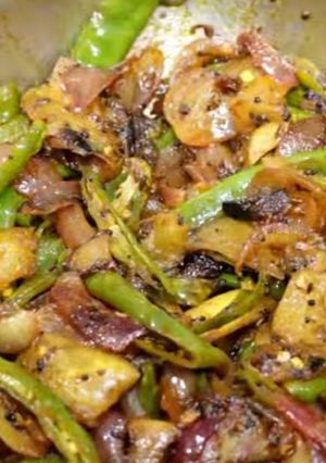 A picture of Onion and raw mango veg.