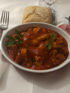 Una foto de Magro de cerdo con tomate