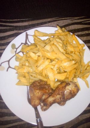 A picture of Chips and deep fried chicken.