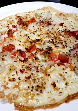 A picture of Onion Tomato Omelette.