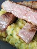 Abanico al romero a baja temperatura sobre parmentier de patata y calabaza