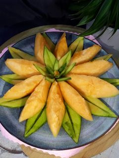 عکسی از دستور میوه آرایی (تزیین طالبی و خربزه)