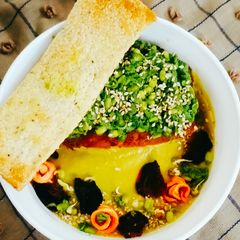 Pumpkin sprout curry with sweet potato sprout boat A picture of Pumpkin sprout curry with sweet potato sprout boat.