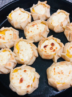 Una foto de Canastitas de zapallo y queso