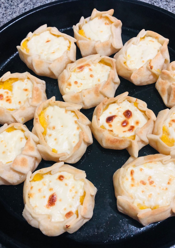 Una foto de Canastitas de zapallo y queso