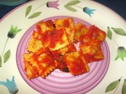 Una foto di ripieno ravioli di carne