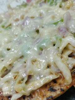 A picture of Leftover roti pizza.