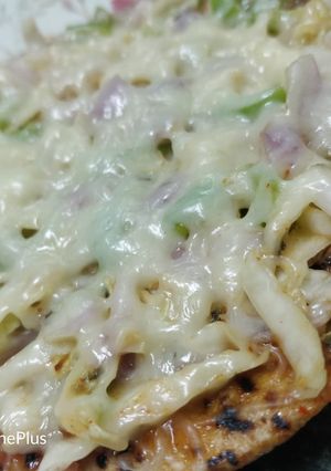 A picture of Leftover roti pizza.