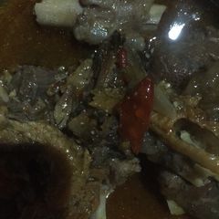 A picture of Dry okra soup with beef and dry fish.