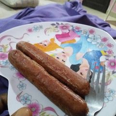 A picture of Fried Sausage by my 8 year old daughter.
