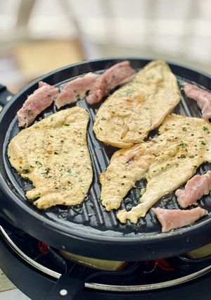 Una foto de Raclette de pollo y secreto