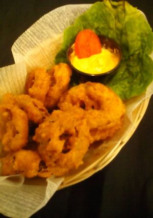 A picture of Guinness battered onion rings.