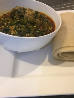 A picture of Semo with fresh okra soup.