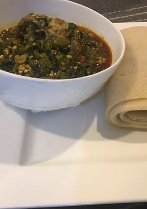 A picture of Semo with fresh okra soup.