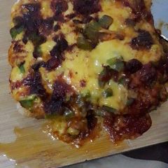 A picture of Easy delicious 4 ingredient bread pizza only under 5 min.